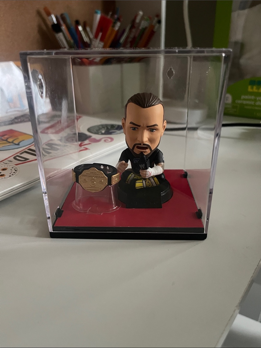 Collectible Wrestling Figure with Championship Belt - Black & Red